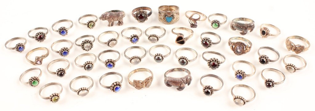 40 STERLING SILVER RINGS SODALITE AND MORE: 40 STERLING SILVER RINGS SODALITE AND MORE Most rings are set with glass, crystal, or sodalite. Weight: 89.8g total Shipping / Pickup: We Can Ship This Item Lot Location: #1 - Manor's Gallery