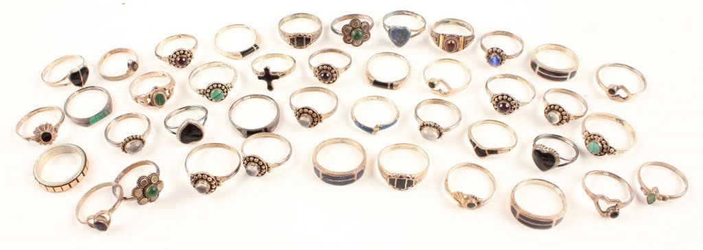 40 STERLING SILVER RINGS SODALITE AND MORE: 40 STERLING SILVER RINGS SODALITE AND MORE Most are set with glass, malachite, or sodalite. Weight: 78.3g total Shipping / Pickup: We Can Ship This Item Lot Location: #1 - Manor's Gallery
