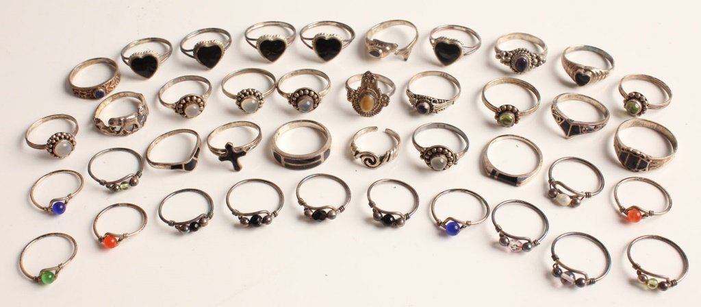 40 STERLING SILVER RINGS SODALITE AND MORE: 40 STERLING SILVER RINGS SODALITE AND MORE Most rings are set with glass, crystal, or sodalite. Weight: 64.3g total Shipping / Pickup: We Can Ship This Item Lot Location: #1 - Manor's Gallery
