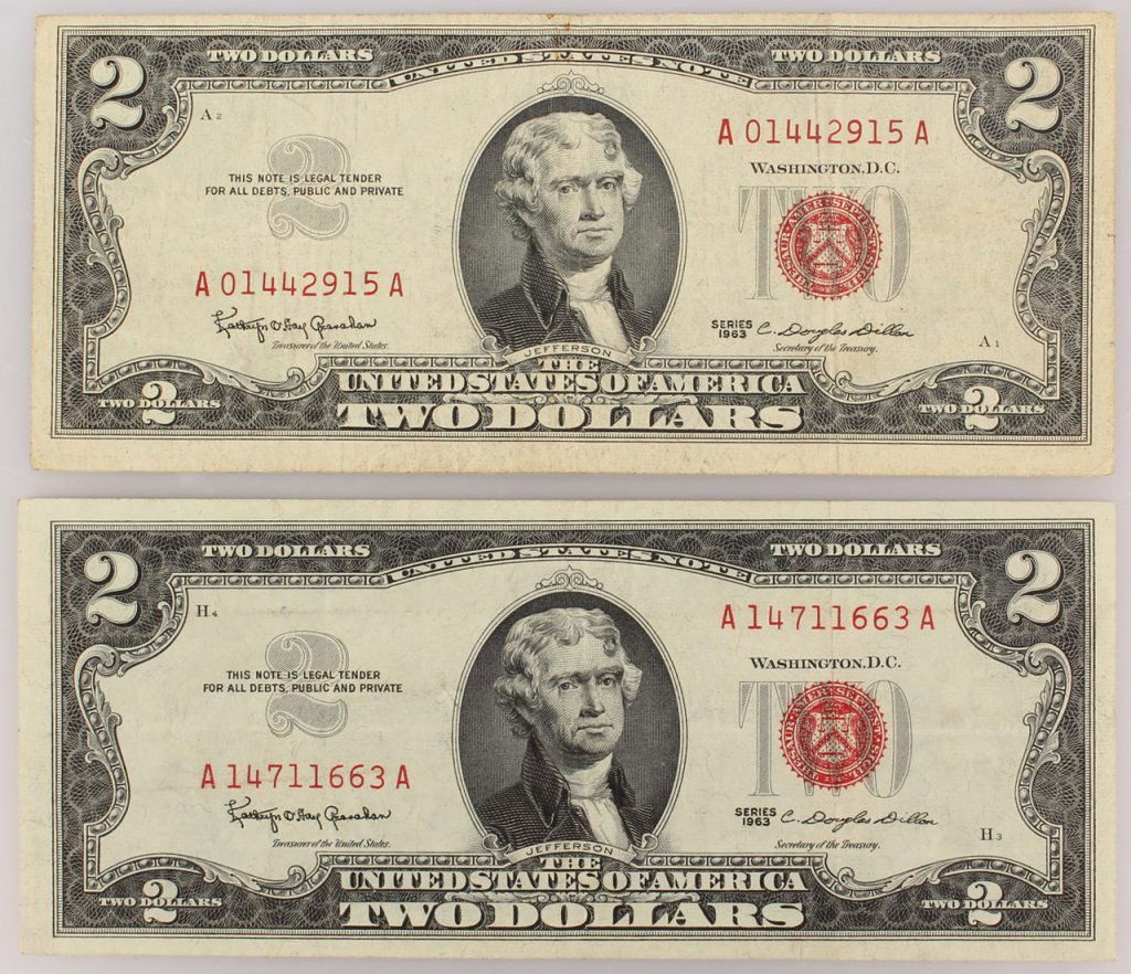 (2) RED SEAL TWO DOLLAR BILLS 1963 SERIES: (2) RED SEAL TWO DOLLAR BILLS 1963 SERIES Lot of 2 Two Dollar Red Seal bills both of the 1963 series. Shipping / Pickup: We Can Ship This Item Lot Location: #1 - Manor's Gallery