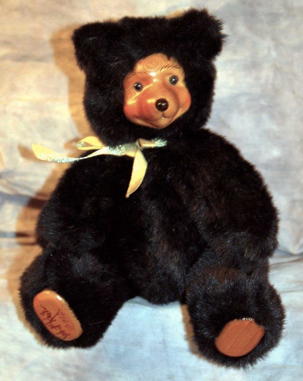 Raikes Bear: Black 11" Robert Raikes hand signed and numbered 766 bear w/ wooden face and paws