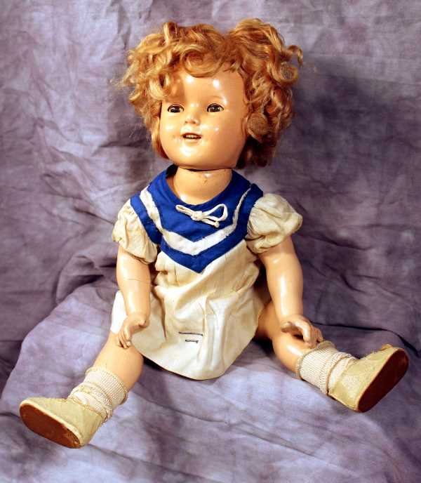 Collectible Dolls: Vintage Shirley Temple Doll, 16" 1930's Jointed Composite Doll. Doll has sleepy eyes, dimples, wigged, and full smile. Mark on rear of head is Cop Ideal N&TC, Some crazing on face and extremities