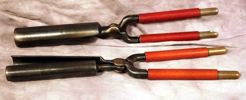 Collectibles: Set of 2 "Milstan" Hair Hot Irons with Insulated handles; 1/2" and 1" Curl Rod. Each measure 10.5 ins
