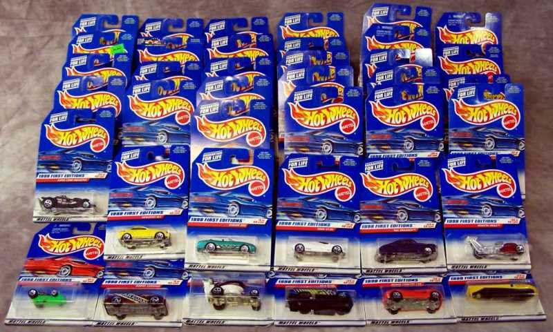Collectibles: Set of 39 or 40 1998 First Edition Series Hot Wheels Model Cars, new on Card, #27 is missing.