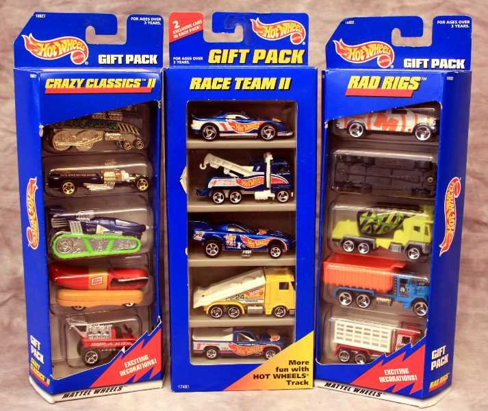 Collectibles: Set of 3 Hot Wheels Gift Packs Collectible cars. Each pack contains 5 Collector Cars and are title; (1) Race Team II, (2) Crazy Classics II, (3) Rad Riggs