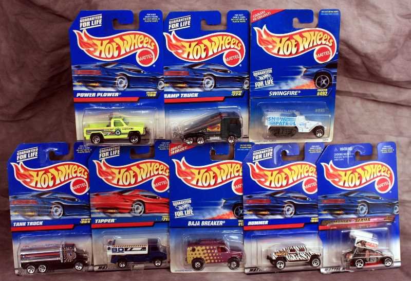 Collectibles: Hot Wheels Collector Cars --(8) Semi Truck and Monster truck Model Cars new on Card