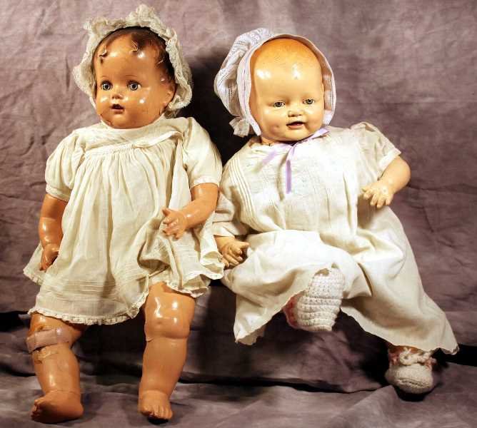 Collectibles: 2 Antique Dolls (1) E.I. H. Co. Inc. 1930s Antique Composite Doll with tin eyes and full mouth and teeth. Expected crackling and crazing over legs and arms, face minor crazing. In vintage garb. Approx