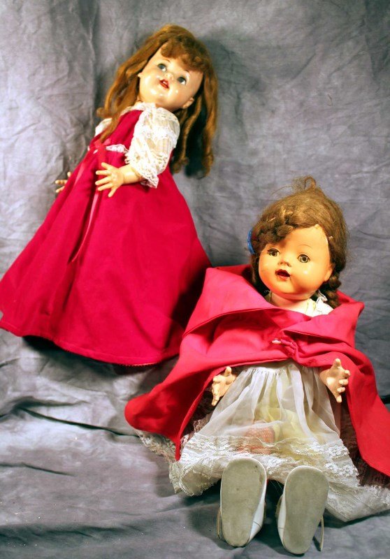 Collectibles: 2 Vintage Standing Dolls (1) Ideal Sleepy and Cry Doll with long gold locks, in red velveteen dress. Approx. 22in; (2) Red Hood Doll with joints for walking w. Sleepy Eyes and full mouth with teeth. A