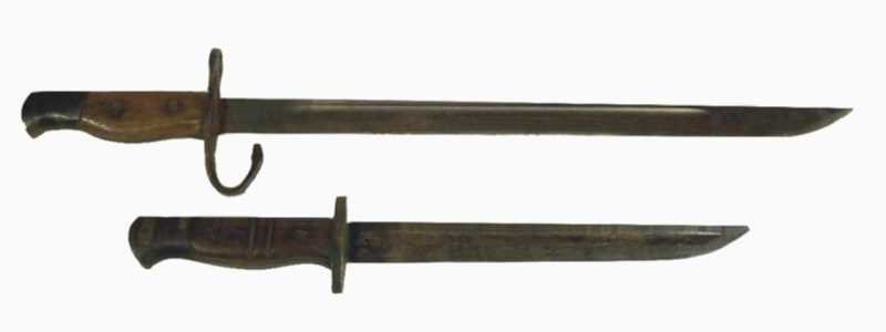 2 Bayonets, 1917 Remington & Arisaka Type: The Remington bayonet was repurposed to make a fighting knife, the slide was filled in, the blade was shortened and sharpened, total length is approx. 13.75". The second bayonet is not marked but look