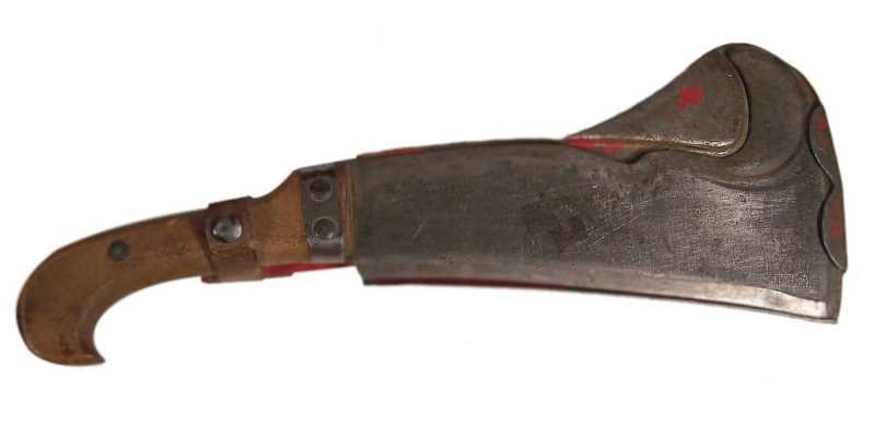 Woodman's Pal #681 Victor Tool Co.: Pressed metal sheath with peeling red paint, wooden handle. Used condition. The blade is marked Woodman's Pal #681 Victor Tool Co. Reading PA. Pat 2335497. Total length is approx. 14.5" long.