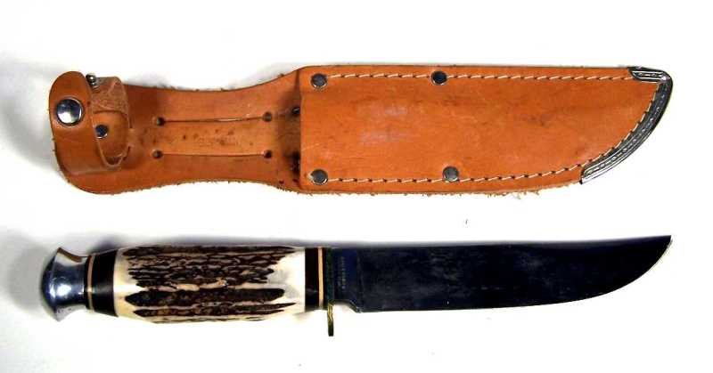 Othello Solingen German Anton Wingen Jr. Knife: Stag handled fixed blade knife with original leather sheath. The blade is marked Anton Wingen Jr. Othello Solingen Germany. The blade is approx. 5" long. Good vintage condition.