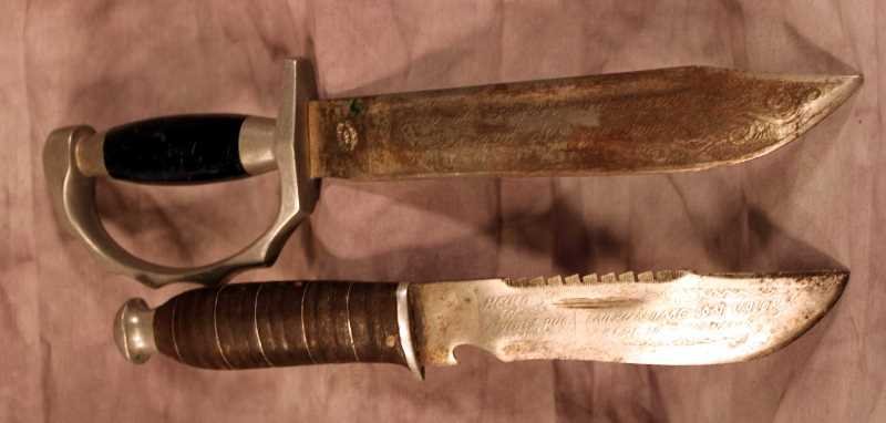 2 Vintage Mexico Knives w/ Etched Blades, Knuckle Guard: Two vintage knives. Aluminum knuckle guard knife, black plastic handle (damaged), marked Mexico, Aztec designs on the approx. 7.75" blade. The second piece is a hunting knife with a saw tooth back and