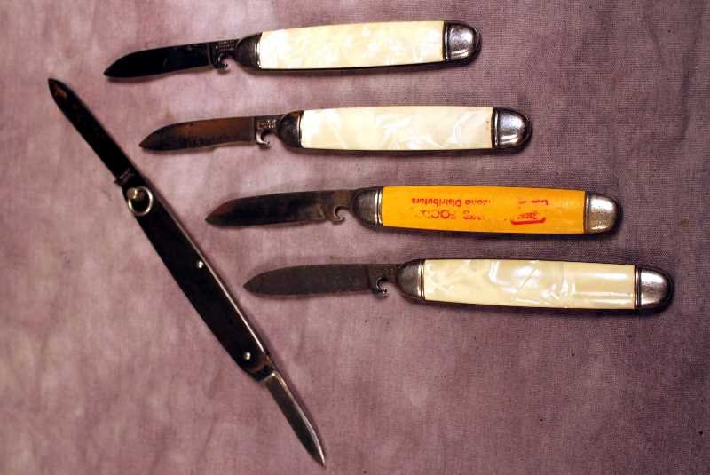 Trick Knife or Magicians Knife Lot: 4 single blade Imperial Trick Knives or Magicians Knives, tilt up and press the blade to open, tilt down and press the blade for it to stay closed, (only 2 are marked Imperial) and a Schrade toggle op