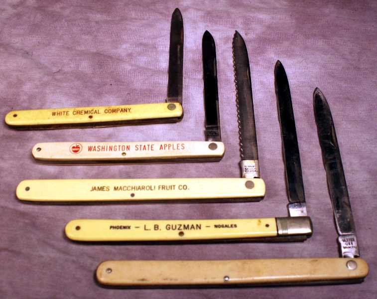 5 Vintage Fruit Knives, Schrade, Ulster, Gerson: Schrade serrated blade with "James Macchiaroli Fruit Co." advertising, approx. 4.25" long blade. 2 Ulster knives, 1 with "Washington State Apples" advertising. 2 Gerson Co. knives, "White Chemical Com