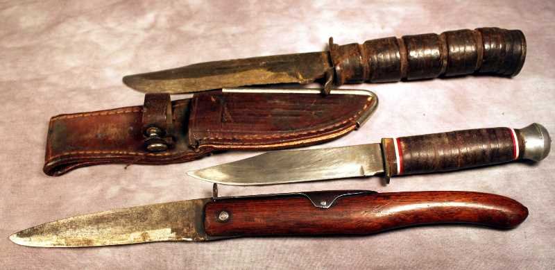 2 Fixed Blade and 1 Folder Knife: Japan made Fixed Blade with sheath; Japan made Fixed Blade w/ rawhide grip; Turn of the Century Locking Wood Handle Knives. Longest blade is approx. 5.75"