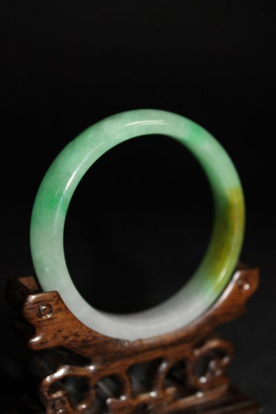 Multi-Colored Jade Bangle: Size : 2.25" Inner Dia. Stand Not Included.