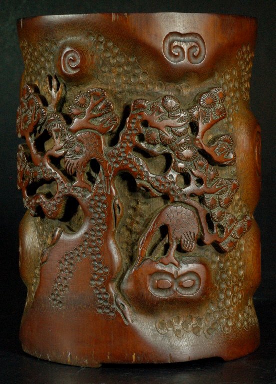 Highly Carved Bamboo Pen Holder: Carved bamboo pen holder, cylindrical form, depicting a landscape scene. Size: 7 1/4" H