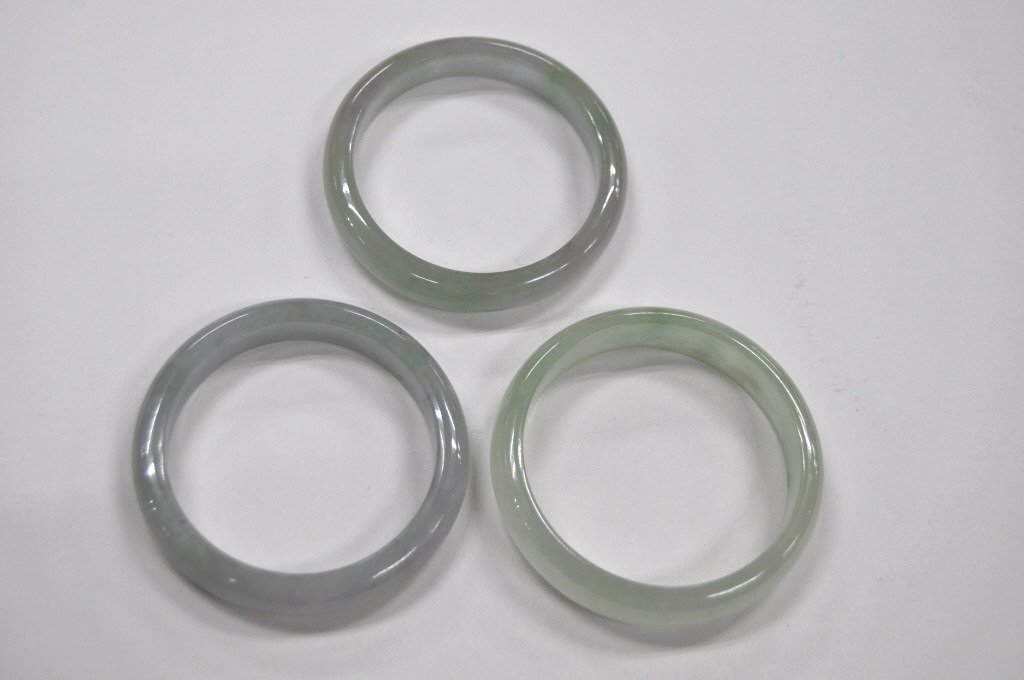 Three Carved Jadeite Bangles (1 of 3)
