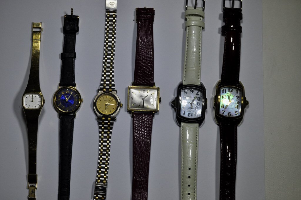 Six Ladies' Wristwatches: Comprising various models and styles, to include Lausanne, Invicta, Gucci, and Seiko.