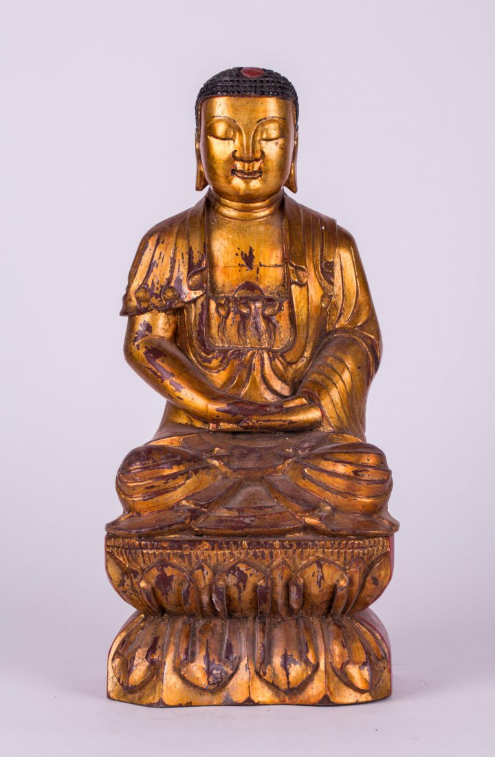 CHINESE GOLD LACQUERED WOOD SEATED BUDDHA: 19th century; 12 1/2 in. h