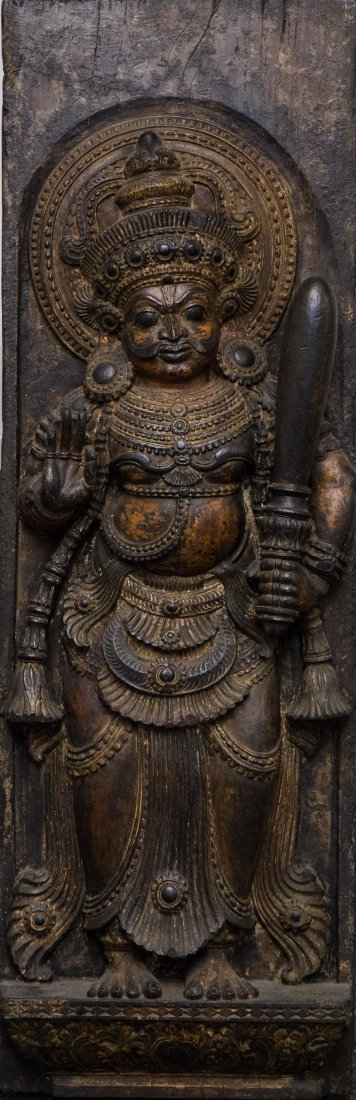 NEPALESE WOOD STANDING BUDDHA: 19th century, standing form with a club; 49 in. h, 15 in. w