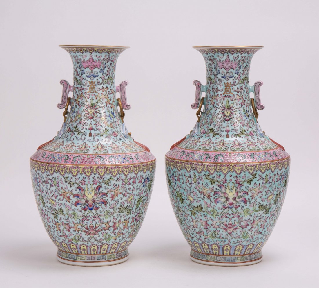A PAIR OF TURQUOISE GROUND FAMILLE ROSE VASE: 20th century, holes drilled on bottom; 13 in. h, 7 1/2 in. w