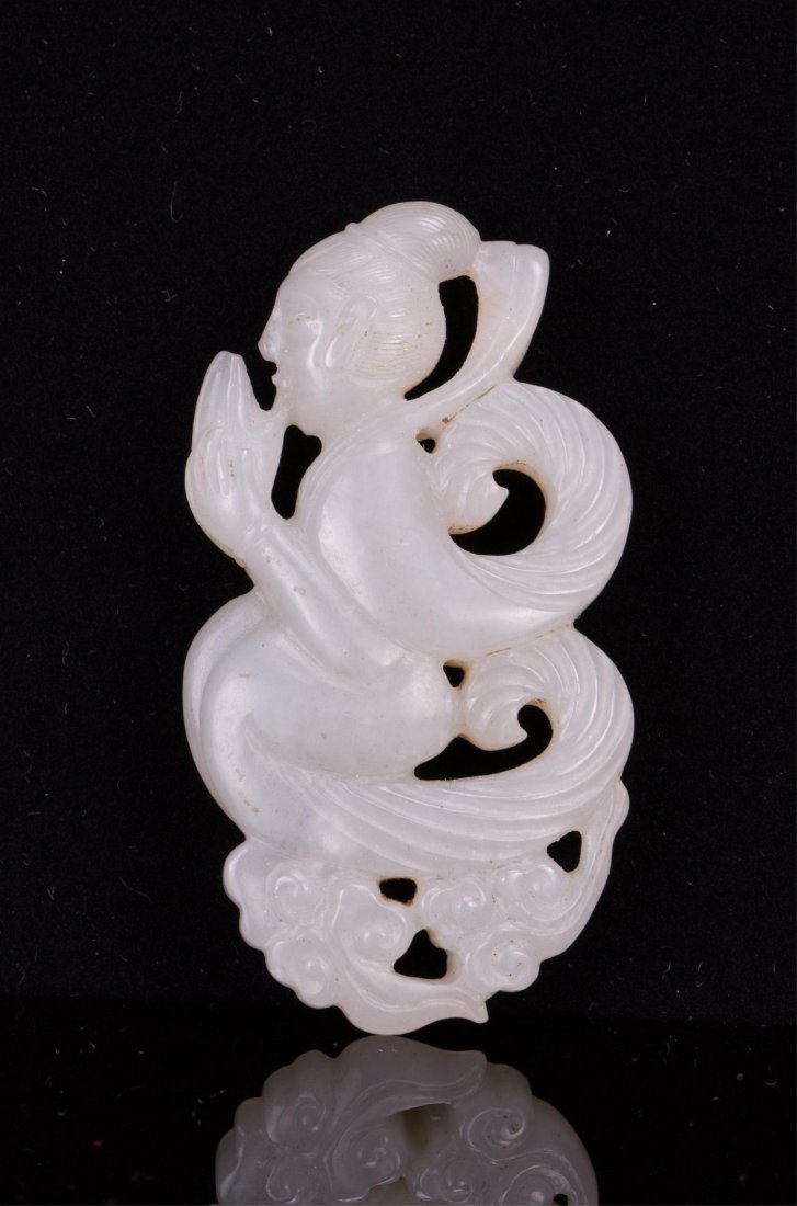 CHINESE JADE BUDDHA ATTENDANT: 19th / 20th century; 2 1/2 in. h, 1 1/4 in. w