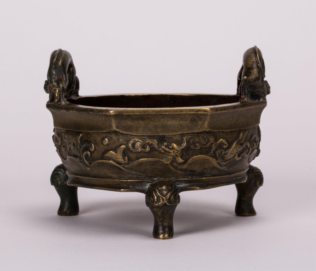 CHINESE BRONZE CENSER WITH DRAGON HANDLE: 18th / 19th century; 3 1/2 in. h, 4 1/2 in. w