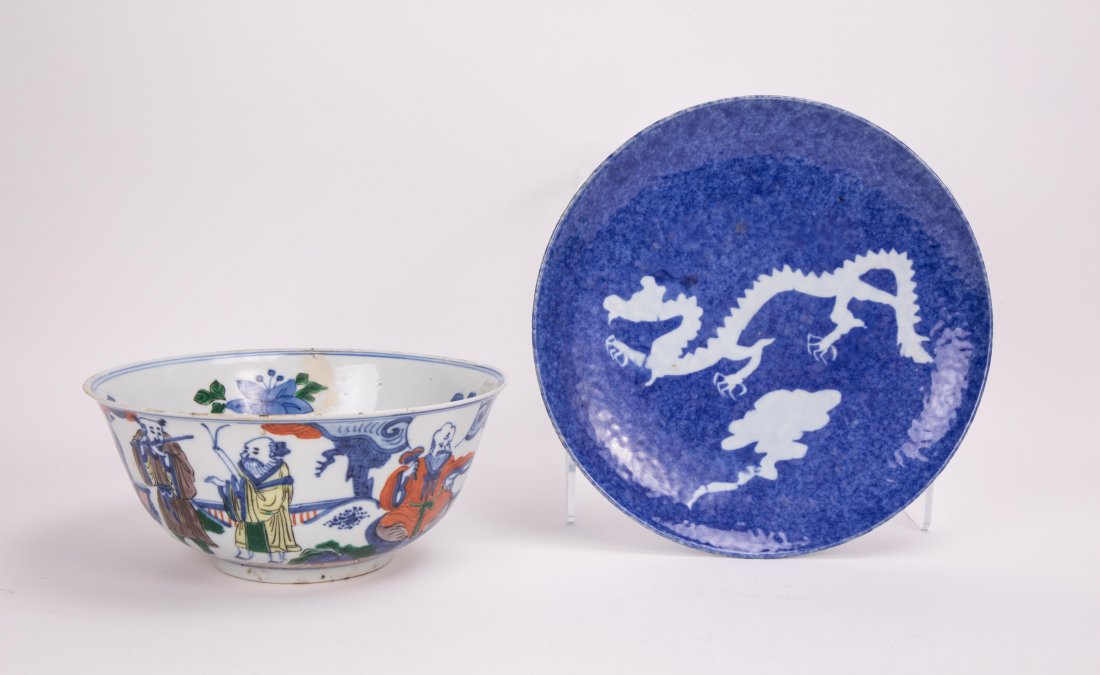 TWO CHINESE PORCELAIN BOWL AND DISH: 19th century, one hairline on the bowl; one blue dragon dish, another wucai bowl; plate (10 in. diameter), bowl (8 1/2 in. diameter)