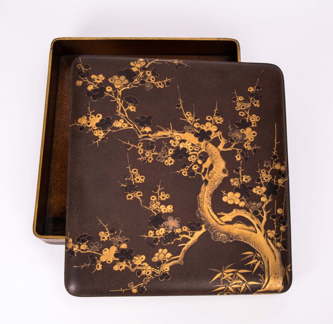 JAPANESE LACQUER DOCUMENT BOX WITH PLUM SCENE: Meiji period, 19th century; 10 by 9 1/2 in.