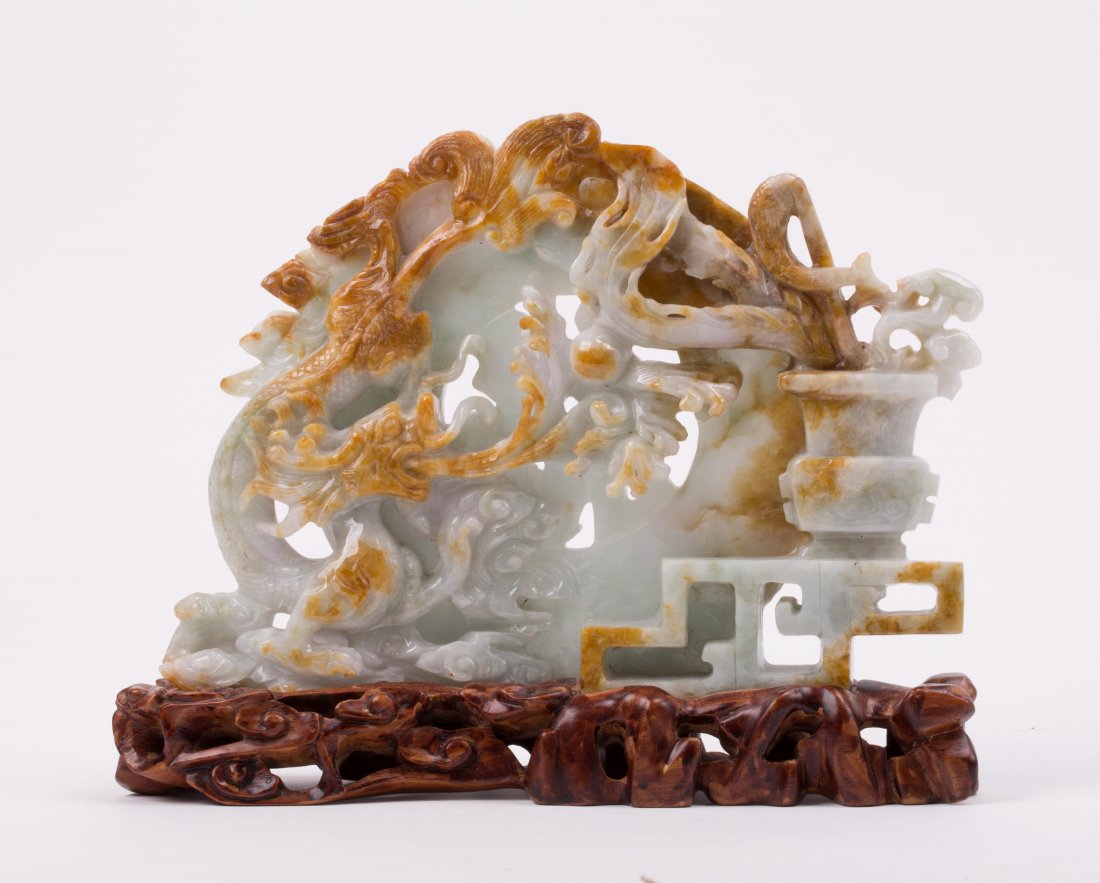 CHINESE CARVED JADEITE SCULPTURE OF DRAGON MOTIF: 20th century; 6 1/2 in. h, 7 1/2 in. w