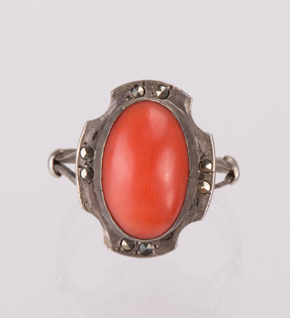 CHINESE SILVER INLAID CORAL RING: Qing dynasty; 7 in. diameter