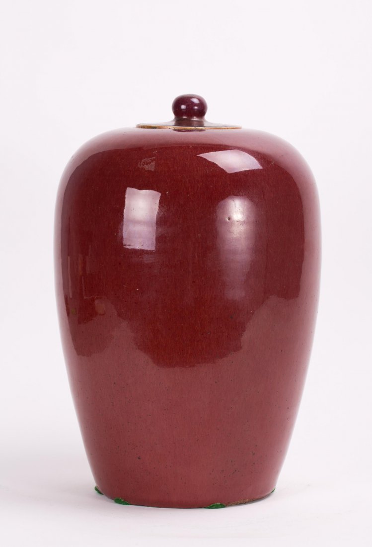 CHINESE RED GLAZED COVERED JAR: 19th century; 13 in. h by 8 1/2 in. w