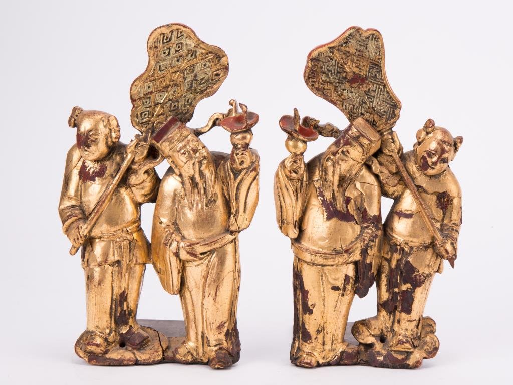TWO GILT WOOD CARVED FIGURINES: Qing dynasty; 8 by 5 in.