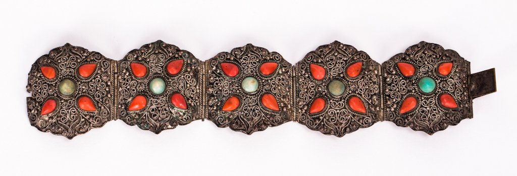 CHINESE BRACELET WITH CORAL AND TURQUOISE INLAY: 20th century; 6 1/2 by 1 1/2 in.
