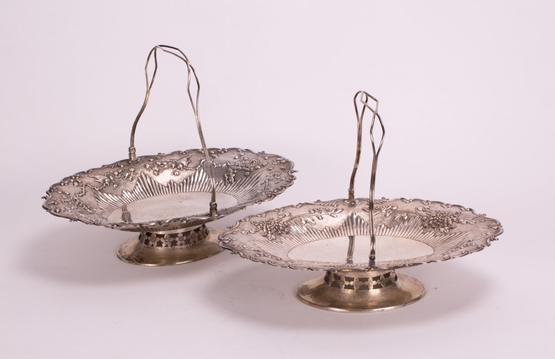 TWO CHINESE EXPORT SILVER DISH BASKET: 19th century, with maker mark. 12 in. L x 8 1/2 in. W x 3 in. H, 38.5 oz/1092 g