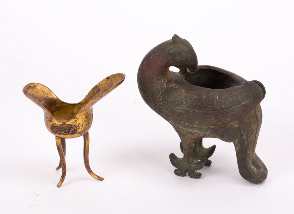 TWO BRONZE ARTICLE - GILT CUP AND ARCHAIC BIRD: 18th century; cup (4 1/2 in. h), bird (5 1/2 in. h)