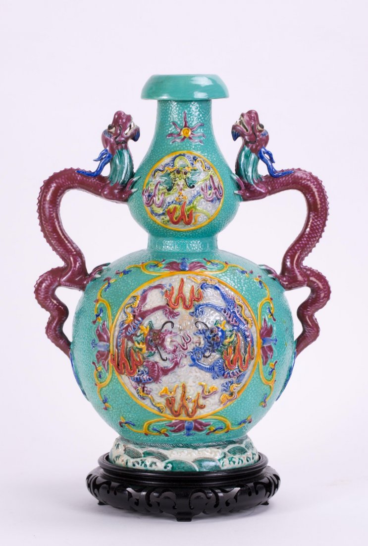 CHINESE MORIAGE PORCELAIN DRAGON VASE: Chinese Moriage Porcelain Dragon Vase. 20th century, with moveable eye, bottom with impressed mark; 14 in. h. Provenance: An Old Long Island Estate Collection