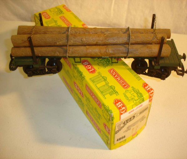 ABT: LGB #4066 N.W.L. Co. Logs Car/Yellow Box: Paul V. Ambrose and Drew J. Bauer present: This is the #4066 Green N.W.L. Co. Flat Car with Logs that LGB made in G Scale in the 1970s/80s. Our Opinion is that it is generally in Like New Condition, n