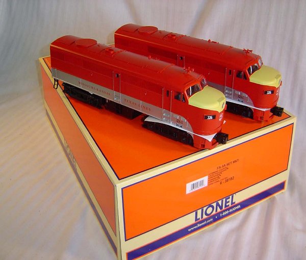 ABT82 Lionel #6-38182 MKT TS FA AA Diesels/OB+: These are the #6-38182 MKT Texas Special AA FA Diesels that Lionel made in 2003. These Diesels are individually numbered (#38183 and #38184) and feature . One powered FA-2 A-unit, one non-powered FA-2