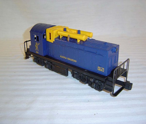 ABT264 Lionel #614 Alaska w/Yellow Blt By Lionel: This is the #613 Alaska Switcher that Lionel made in 1959. This is the very rare variation with the painted yellow border around the Built by Lionel Lettering. Has the usual but very slight hairline c