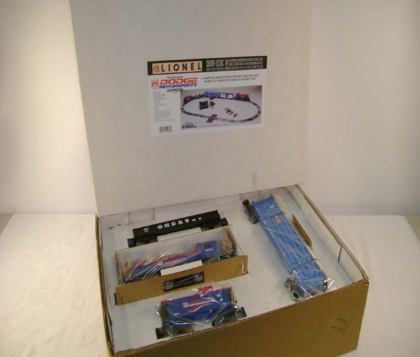 ABT: Mint Lionel #11933 Dodge Motorsports Express: Paul V. Ambrose and Drew J. Bauer present: This is the #11933 Dodge Motorsports Express Train Set that Lionel made in the 1990s. This Uncatalogued Set features a SW-2 Switcher, a Box Car, a screened A