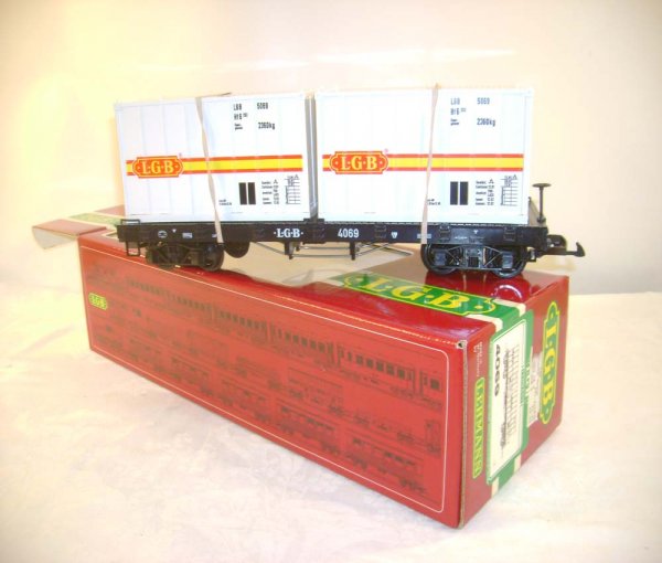 ABT: LGB #4069 Flat Car with Two Containers/OB: Paul V. Ambrose and Drew J. Bauer present: This is the #4069 FLat Car with Two Containers that LGB made in G Scale several years ago. Our Opinion is that it is generally in Like New Condition, minor s