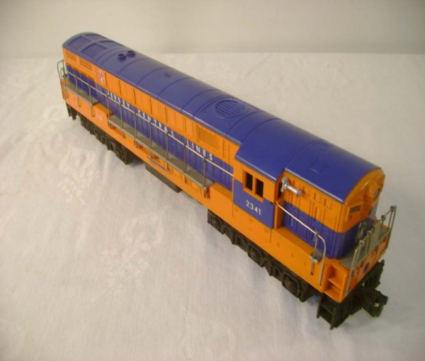 ABT: Lionel #2341 Jersey Central FM Diesel: Paul V. Ambrose and Drew J. Bauer present: This is the #2341 Jersey Central FM Diesel that Lionel made circa 1956. Dull Orange Variation. Proper and very clean 1956 Chassis. Heat-stamped lettering. Ou