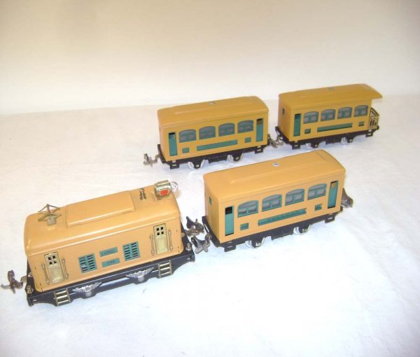 ABT: Lionel #248 Orange Electric w/#629/629/630 Pas: Paul V. Ambrose and Drew J. Bauer present: These are the #248 Orange Electric and the matching #629/629/630 Passenger Cars that Lionel made in O Gauge in the later 1920s. An old repaint. Our Opinion i