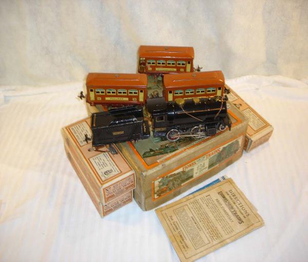 ABT:Scare Lionel #234 Passenger Set 1930/OBs: This is the #234 Passenger Set that Lionel made in O Gauge in 1930. Scarce. This Set includes the #258 Black Steam Engine, the #258T Black Tender, two #529 Terra-Cotta Pullmans and a #530 Terra-Cotta