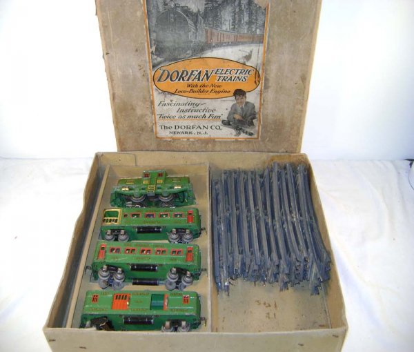 ABT: Dorfan O Gauge #53 Electric & 3 Pass Cars/Se: Paul V. Ambrose and Drew J. Bauer present: This is a Narrow (O) Gauge Passenger Set that Dorfan made in the late 1920s. Includes the #53 Green Take-a-part Electric with Red Frames, the #492 Apple gree