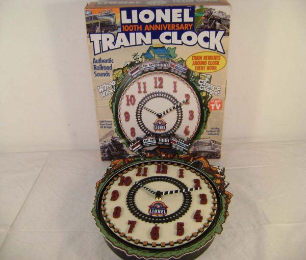 ABT: Lionel 100th Ann.Train Clock/OB: Paul V. Ambrose and Drew J. Bauer present: This is the 100th Anniversary Limited Edition Trail Clock (with Train Sounds) that Lionel made a few years ago. Our Opinion is that it is generally in Mint C