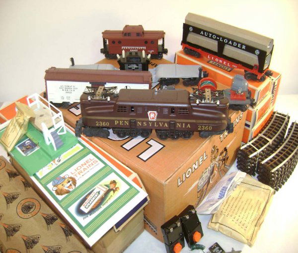 ABT: Mint Lionel #2293W GG-1 1957 Ft Set/ OBs: Paul V. Ambrose and Drew J. Bauer present: This is the #2293W GG-1 Freight Set that Lionel made in 1957. This Set includes the #2360 Pennsylvania GG-1 Electric, the #6414 Auto Loader, the #3650 Search