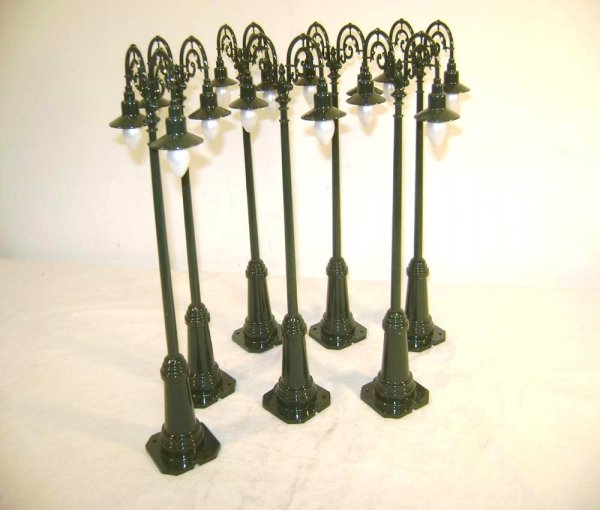 ABT: 7 MTH #67 Dark Green Double Gooseneck Lamps: Paul V. Ambrose and Drew J. Bauer present: These are seven #67 type Dark Green Double Gooseneck Lamps that MTH made a few years ago as a remake of the Lionel Accessory from the 1920s. Our Opinion is t